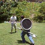 At Polycon during the summer of 2001, some of our guests get a chance to try out NERO-style boffer combat.