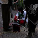 Liandrin prepares her scrolls and components for the formal magic.