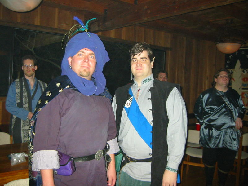 Sir Edwin Terminus and Sir Toren Hawkmantle (foreground) with Guildmaster Forest and Sir Gilden Urswell (background)