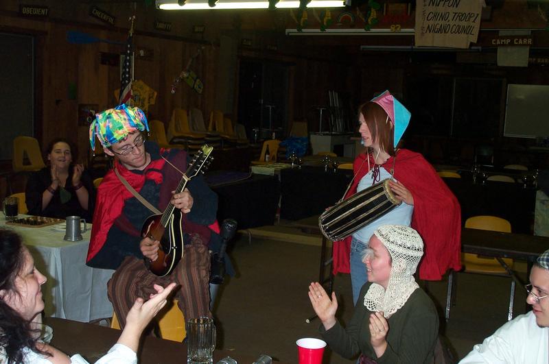 A pair of minstrels come to sing for dinner.