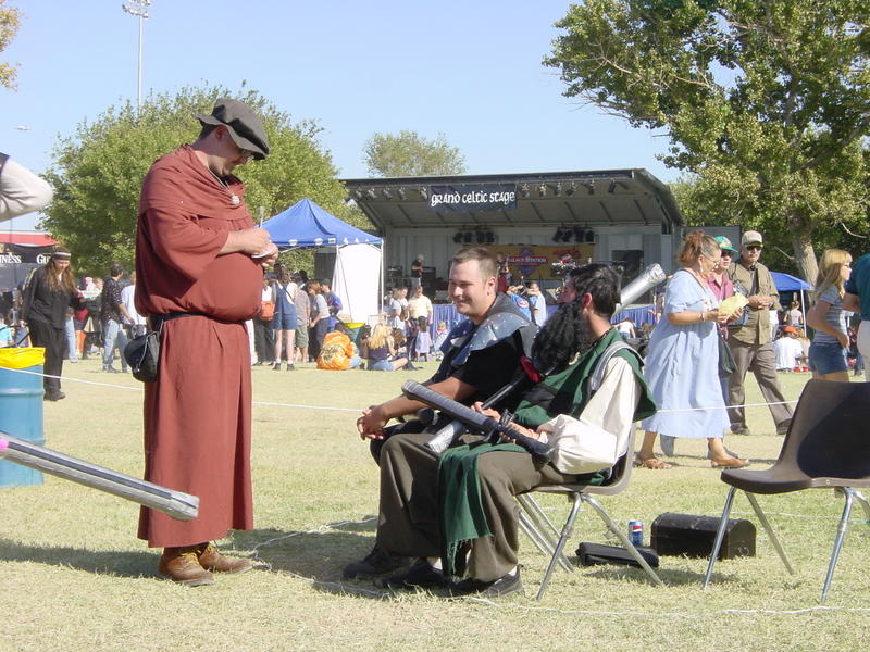 The scribe addresses some folks.