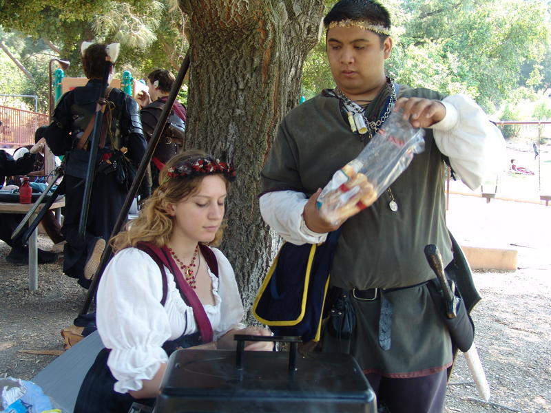 Kayin's Back, Nicci grilling (which Kayin should be doing..) Verix preparing the bread. Fellet might be eating. Or sneezing.